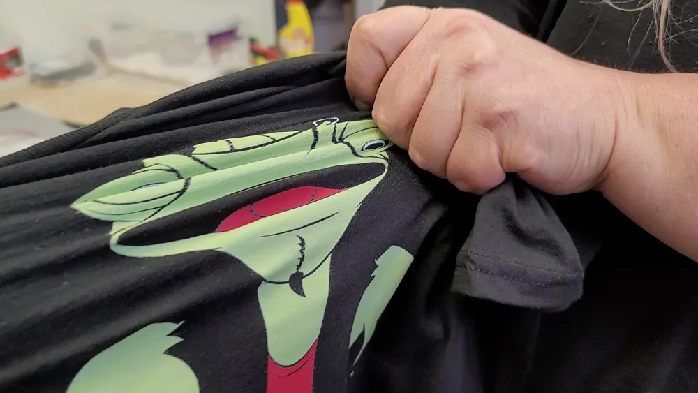 Stretch test on a printed Fan Club Shirts tee