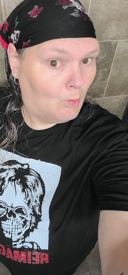 A customer wearing a Fan Club Shirts skull tee